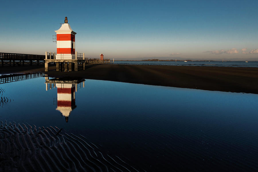 Lignano Lighthouse Photograph by Wolfgang Stocker