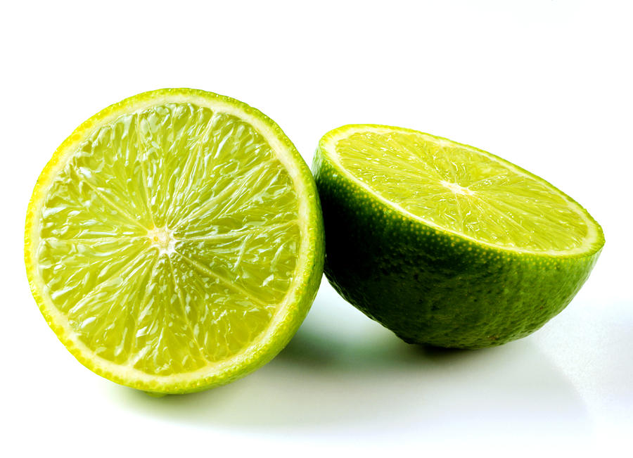 Lime sliced in half Photograph by Joff Lee