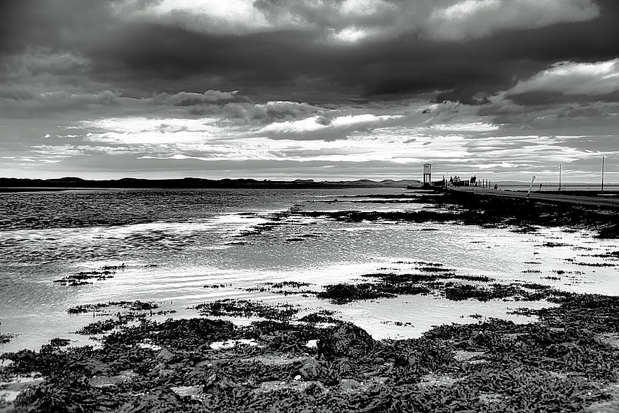 Lindisfarne tidal causeway Photograph by Christopher Maxum