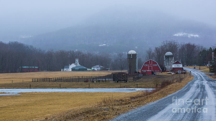 Lingering snow showers in West Arlington. Photograph by New England Photography