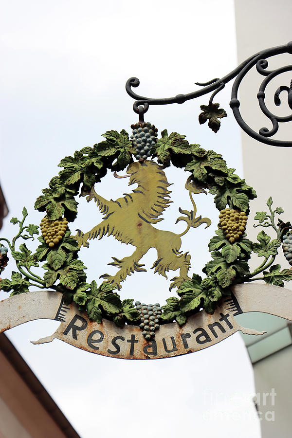 Lion Restaurant Sign Photograph by Christiane Schulze Art And Photography