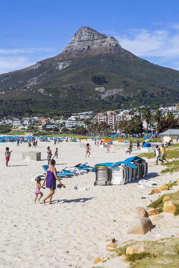 Lions Head behind Camps Bay sandy beach Photograph by Merten Snijders