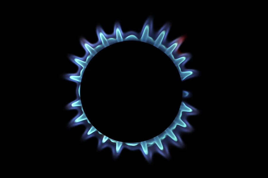 Lit blue gas ring, close-up Photograph by Sami Sarkis