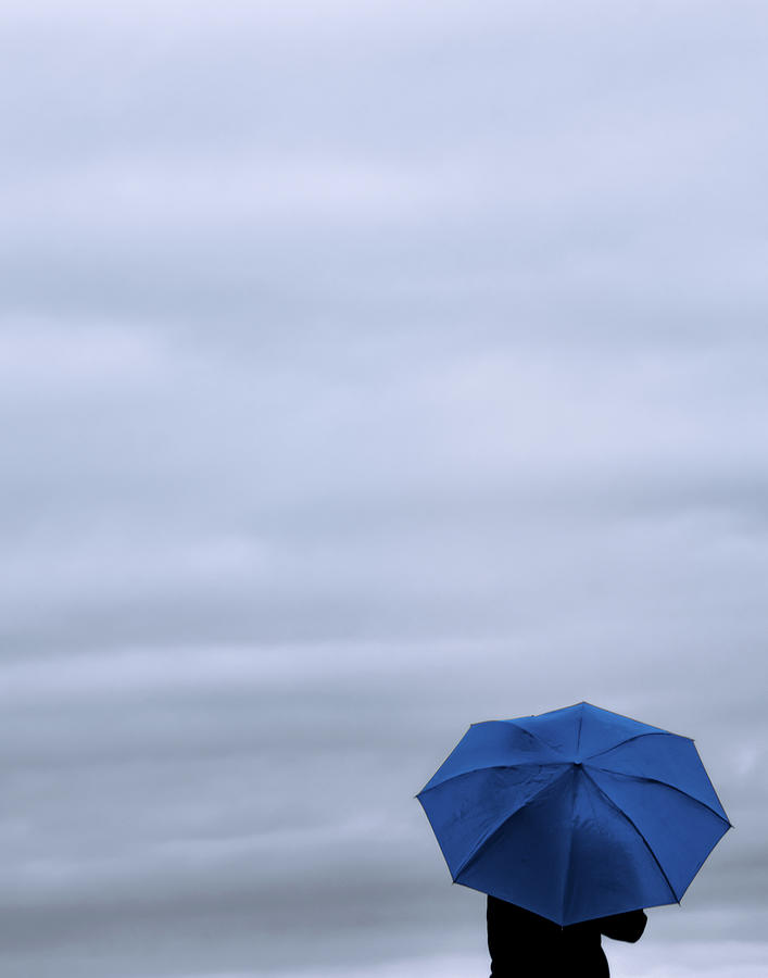Little Blue Umbrella in a Big Universe Photograph by Don Schwartz
