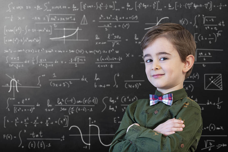 Little Boy Mathematics Formula on Chalkboard Photograph by Sucek