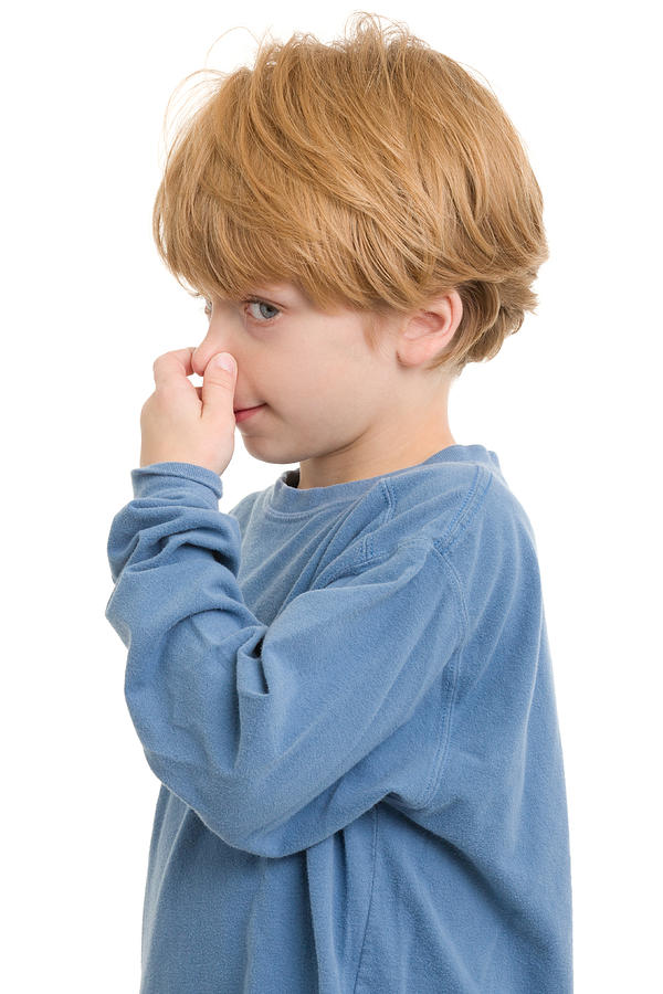 Little Boy Pinching Nose Photograph by Drbimages