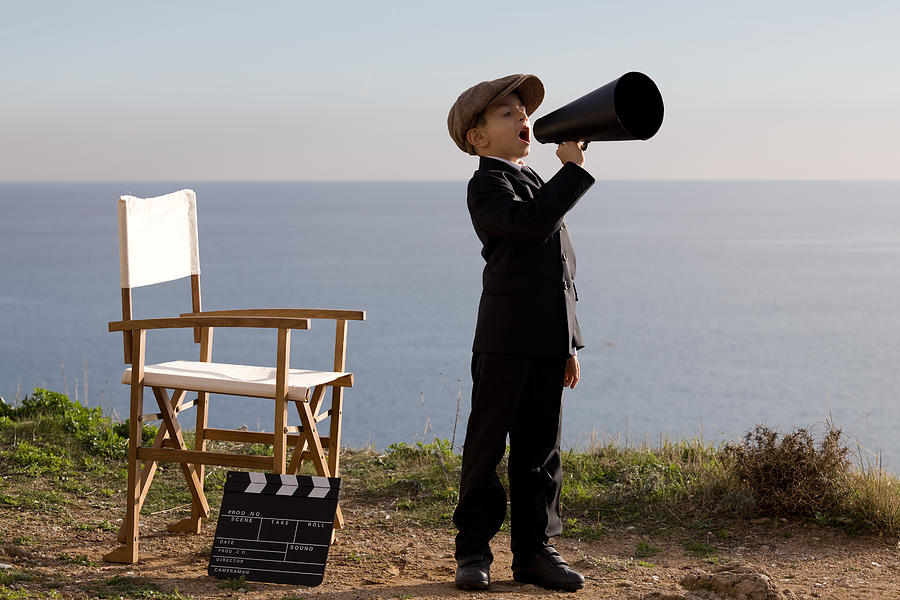 Little Film Director Shouting With Megaphone In Outdoor Set Photograph by Selimaksan