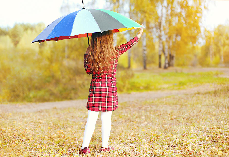 Little girl child with colorful umbrella in autumn day Photograph by Rohappy