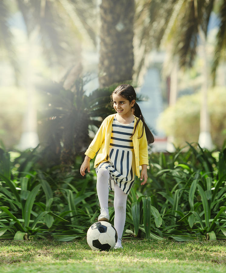 Little Girl Playing Football Photograph by Visualspace