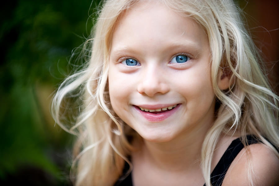 Little girl with big blue eyes and blonde hair Photograph by Pamspix