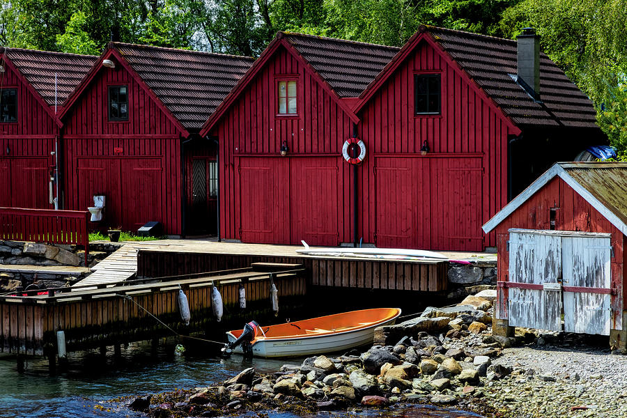 Little Red Fishing Huts Photograph by Debra and Dave Vanderlaan