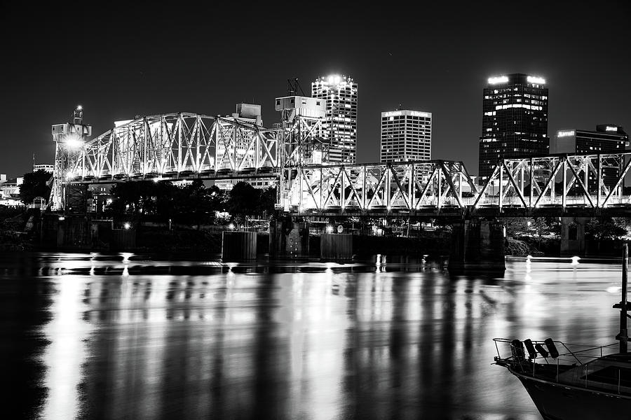 Little Rock Radiance - Illuminated Junction Bridge and Monochrome Downtown Skyline Photograph by Gregory Ballos