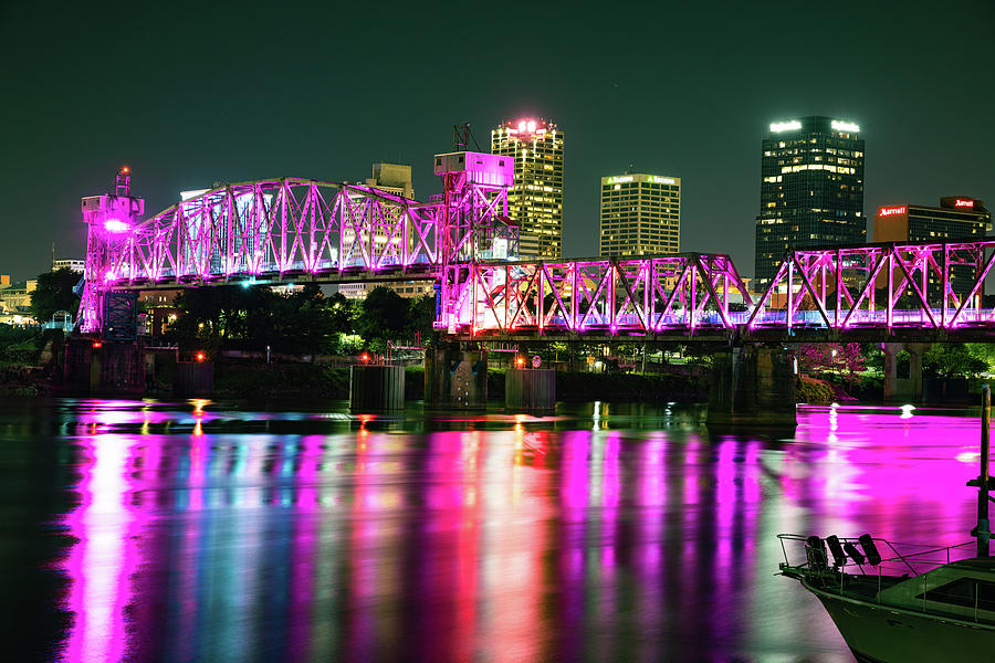 Little Rock Radiance - Illuminated Junction Bridge and Vibrant Downtown Skyline Photograph by Gregory Ballos