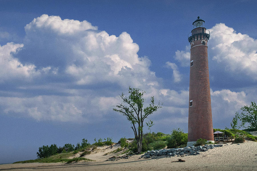 Little Sable Lighthouse with Cloudy Blue Sky by the Lake Michiga Photograph by Randall Nyhof