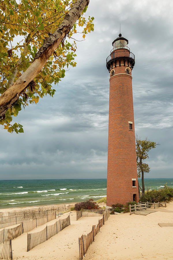 Little Sable Point Lighthouse in Autumn Photograph by Adam Romanowicz