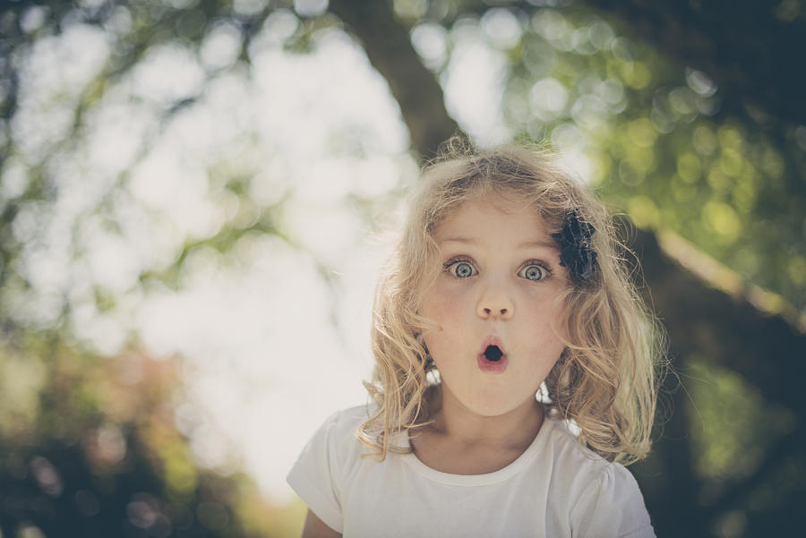 Little Surprised Blond Girl With Blue Eyes Photograph by Altmodern