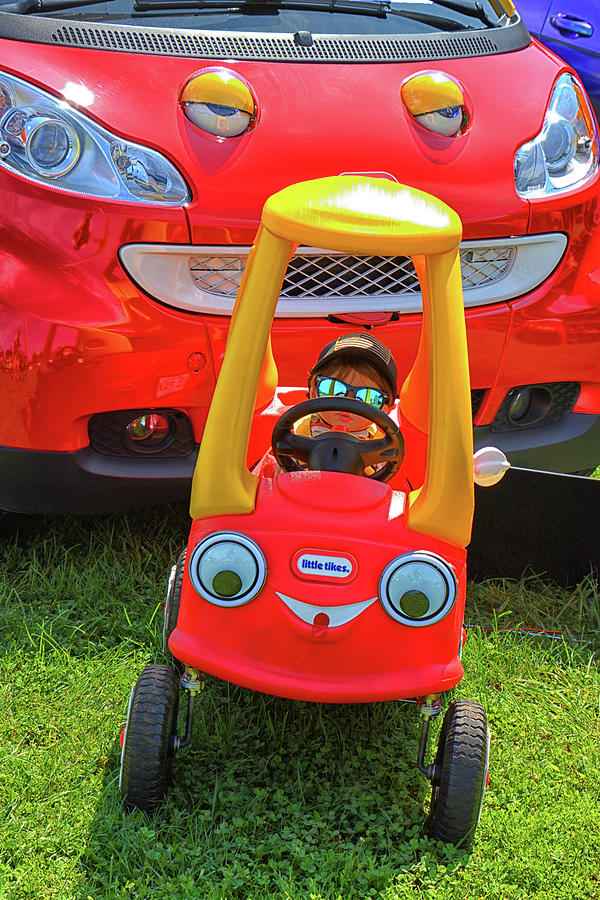 Little Tikes in front of Smart Car Photograph by Mike Martin