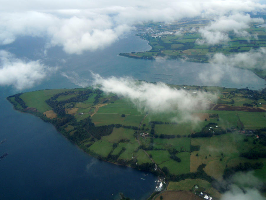 Llanquihue lake, Chile, aerial view through clouds Photograph by Germán Vogel
