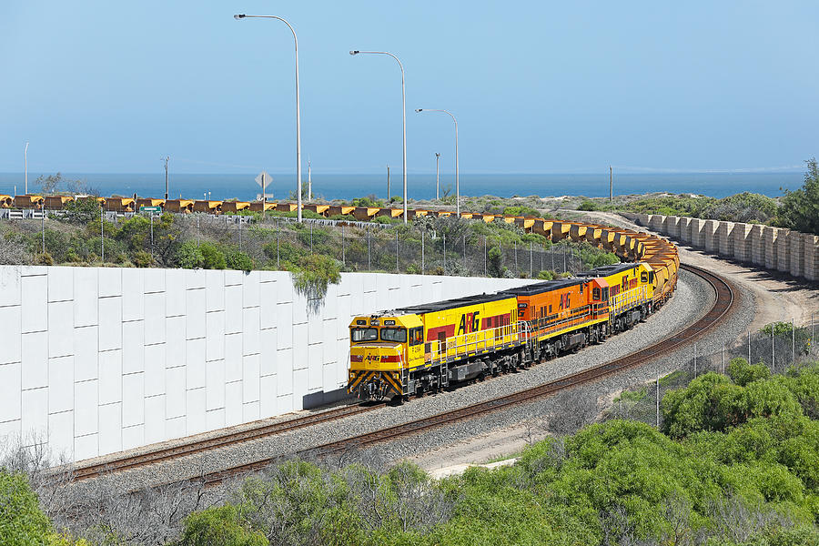 Loaded Mount Gibson iron ore train arrives at Geraldton Port Photograph by BeyondImages