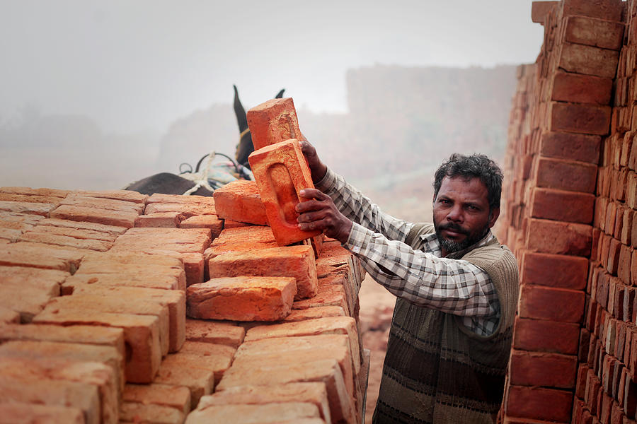 Loading bricks from the kiln Photograph by Pixelfusion3d