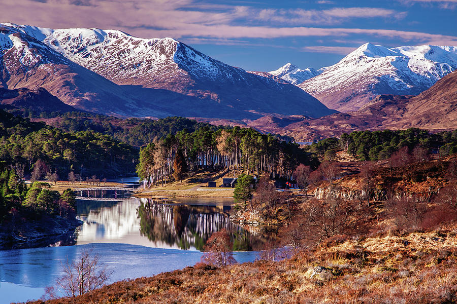Loch Affric emerging from winters grip Photograph by John Frid