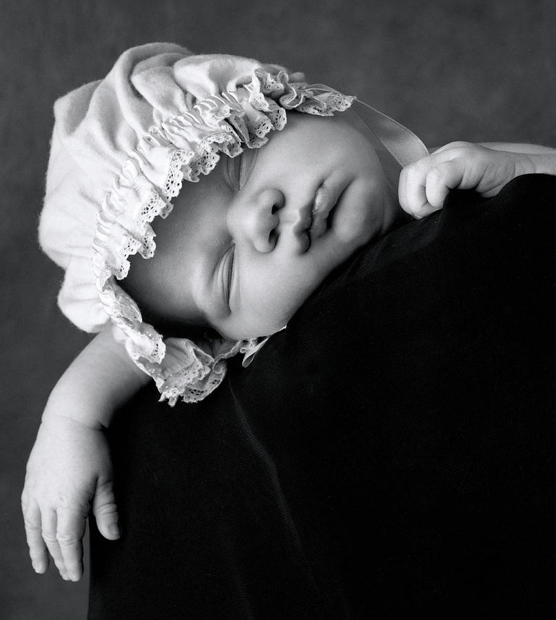 Black And White Photograph - Lochie Sleeping by Anne Geddes