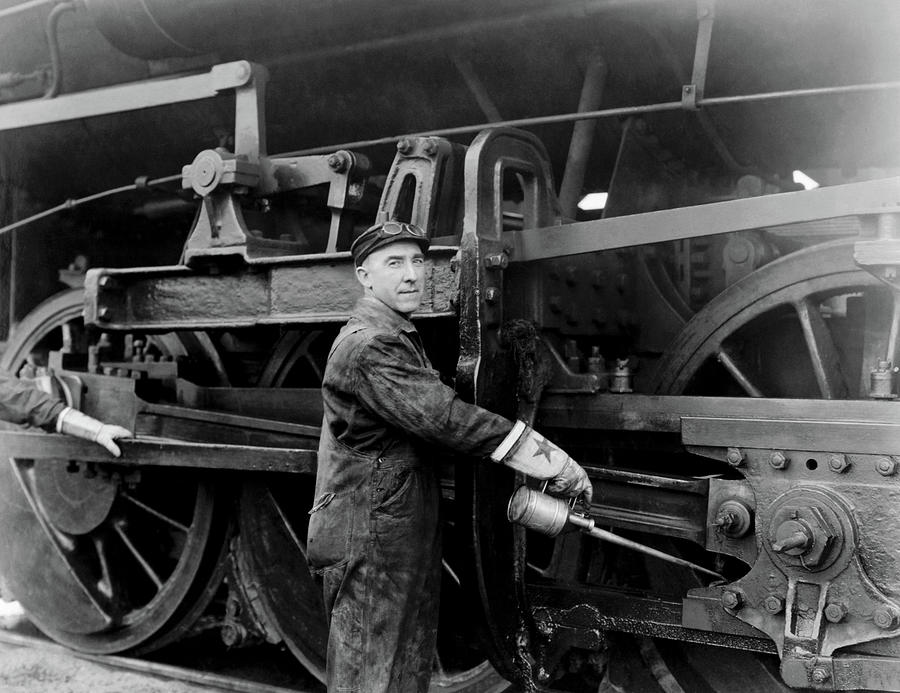 Locomotive Engineer With Oil Can - Circa 1923 Photograph by War Is Hell Store