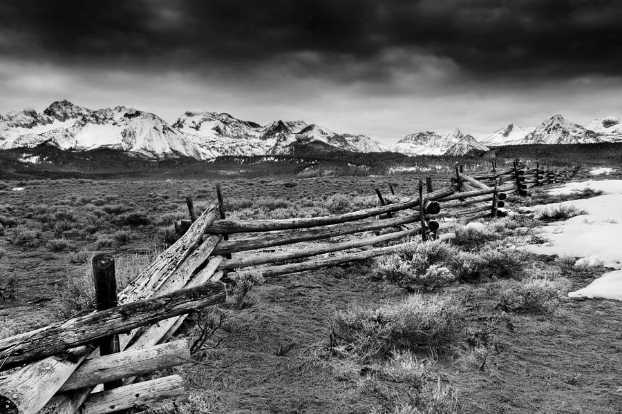 Log fence, Sawtooth Mountains in black and white Photograph by Anna Gorin