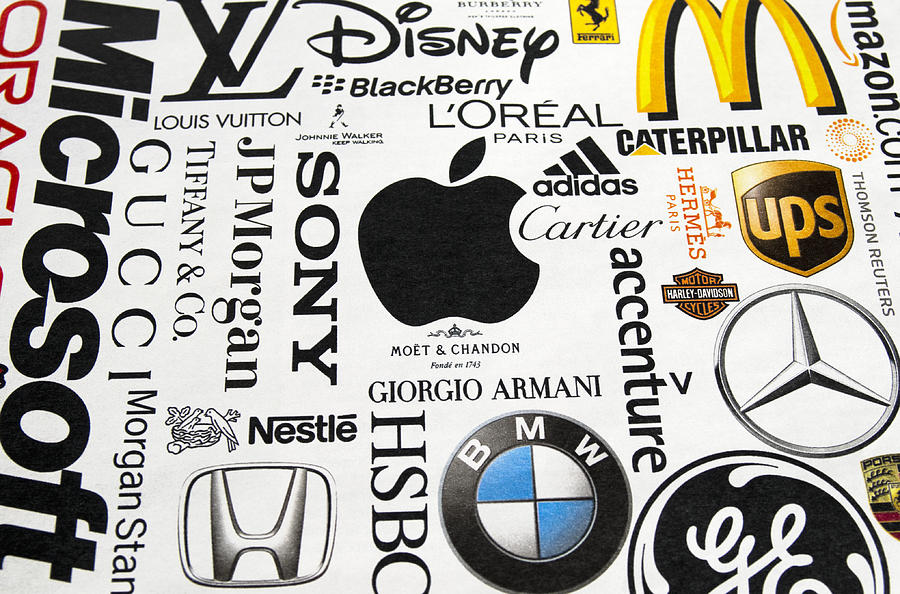 Logos printed in a magazine Photograph by Whitemay