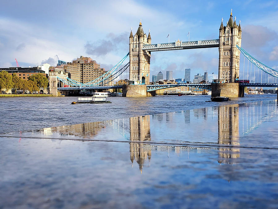 London Bridge Puddle Reflection Photograph by Andrea Whitaker