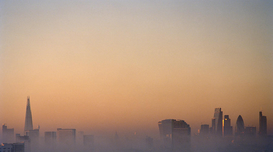 London city skyline on a foggy evening Photograph by Gary Yeowell