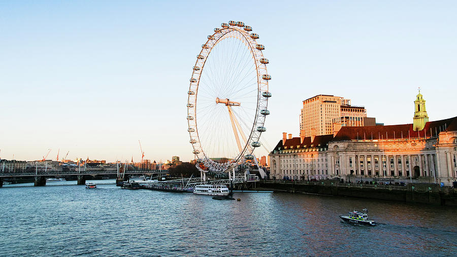 London Eye beautiful sundown near river thames by Santosh Puthran London Eye beautiful sundown near river thames by Santosh Puthran