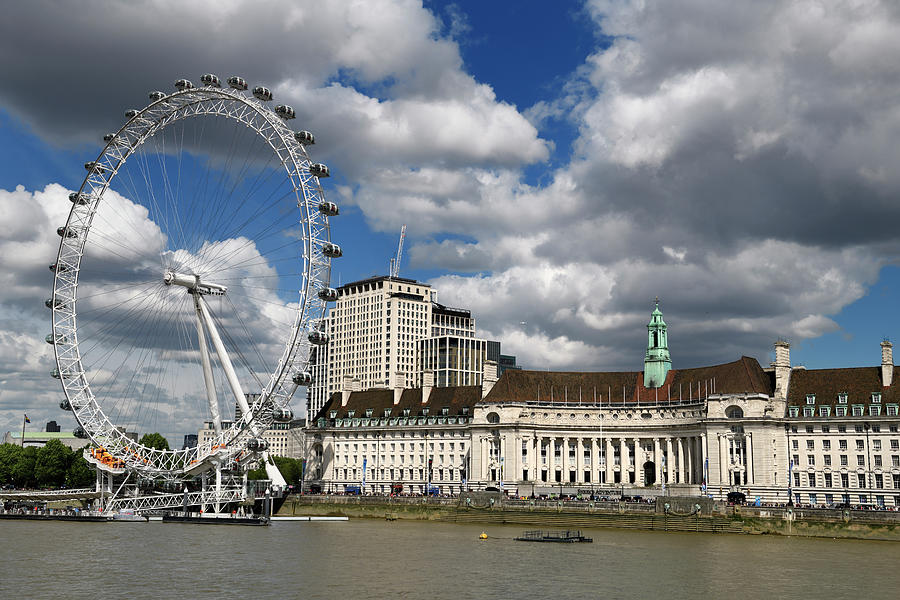 London Eye on the River Thames with tourists lined up at Shrek's ...