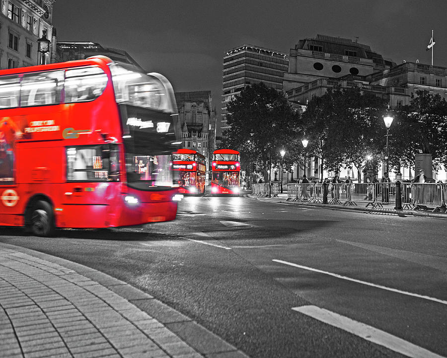London UK Trafalgar Square United Kingdom rounding the bend Selective Color Red Photograph by Toby McGuire