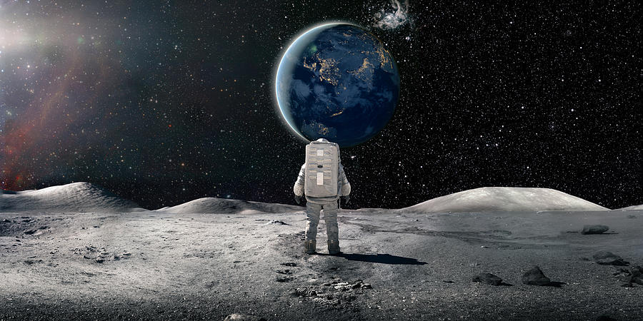 Lone Astronaut In Spacesuit Standing On The Moon Looking At The Distant Earth Photograph by Peepo