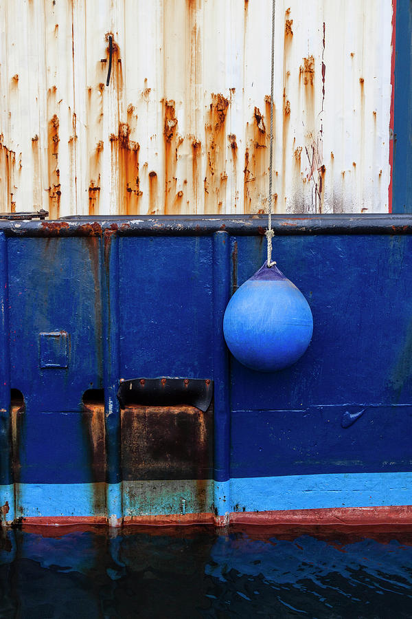 Lone Blue Bumper on Fishing Boat Photograph by Carol Leigh