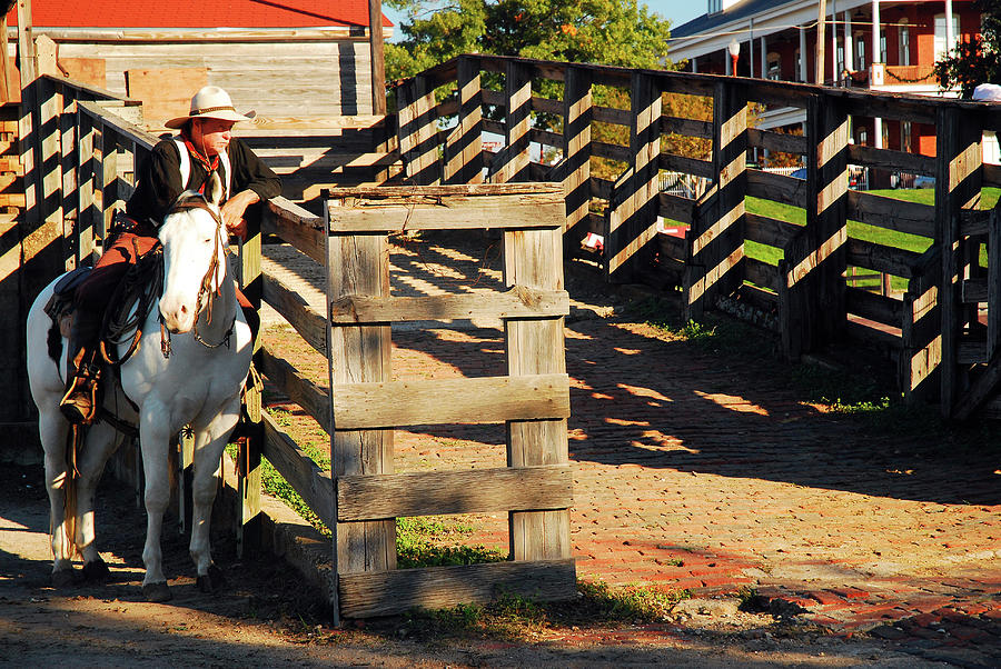 Lone Cowboy at the ranch Photograph by James Kirkikis