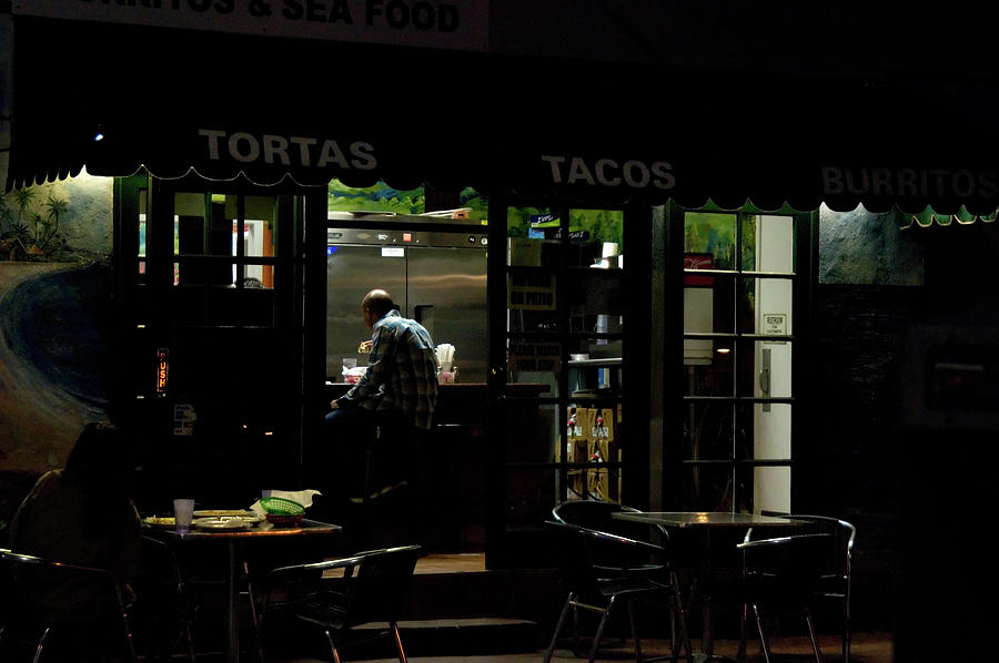 Lone Man in a Taco Stand Late at Nigh Photograph by Mark Stout