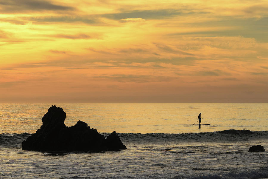 Lone Paddleboarder at Sunset Photograph by Matthew DeGrushe