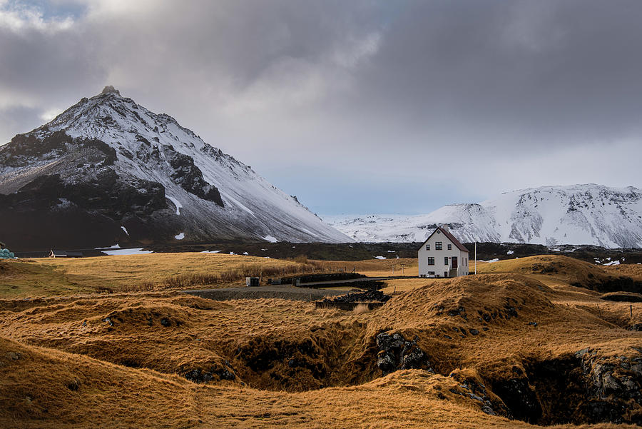 Lonely house and Stapafell mountain covered with snow, Arnarstap Photograph by Michalakis Ppalis