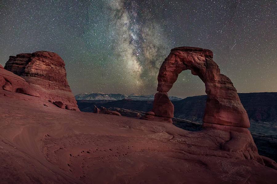 Long exposure milky way and light painting on Delicate Arch Photograph by Rod Gimenez