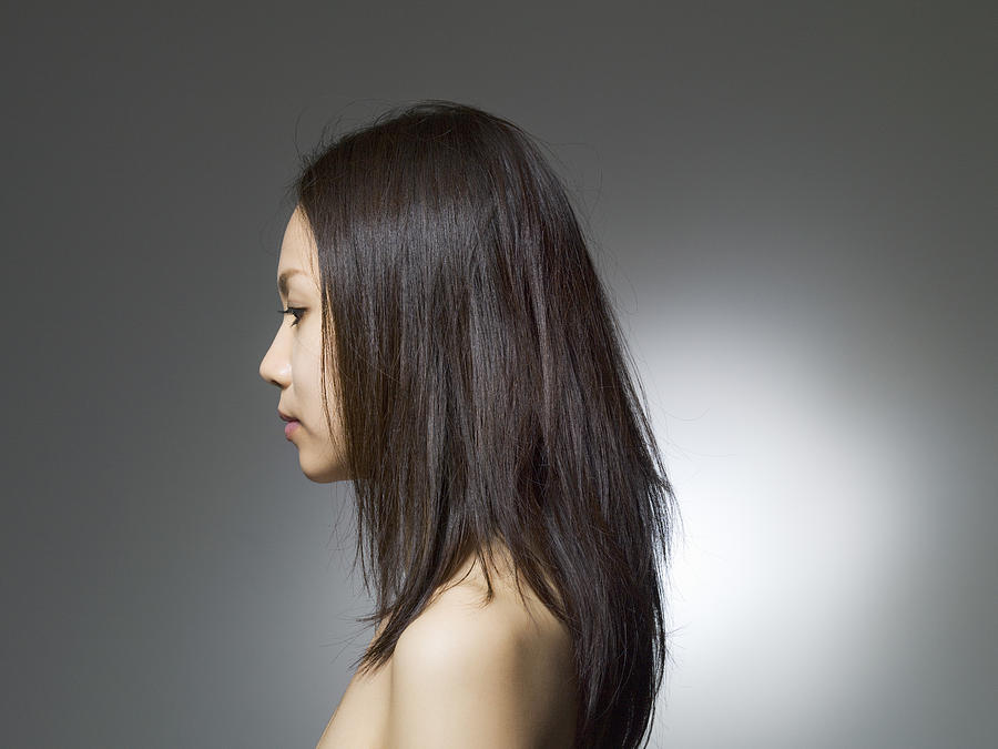 Long haired woman who turns to width Photograph by Kokouu