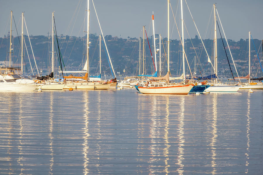 Boats Casting Long Reflections On San Diego Harbor Photograph by Joseph S Giacalone