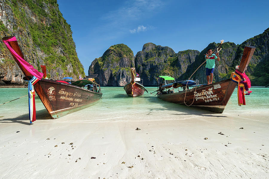 Long tail boats at Maya Bay - Koh Phi Phi - Thailand Photograph by Olivier Parent