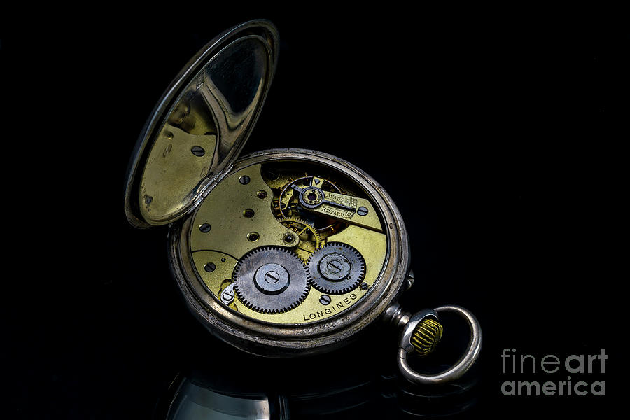 Longines classic mechanical watch. Black background Photograph by Pablo Avanzini