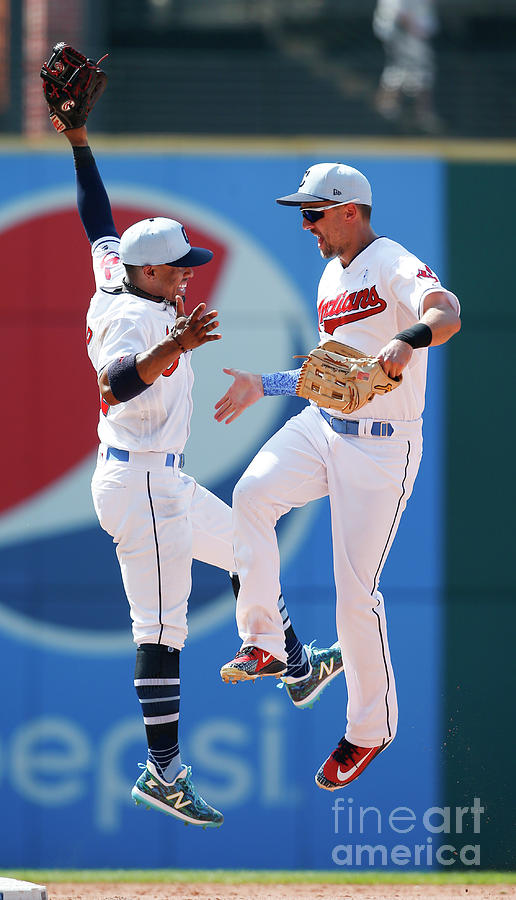 Lonnie Chisenhall and Francisco Lindor Photograph by Ron Schwane
