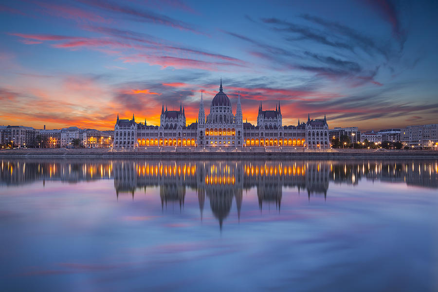 Looking at Hungarian parliament from across water at night Photograph by Focusstock