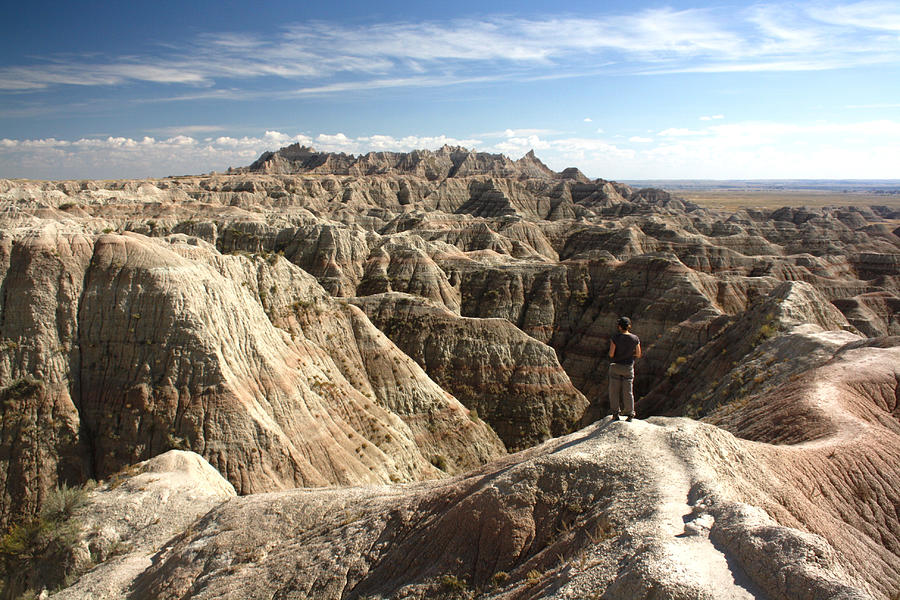 Looking out over the Badlands Photograph by by Mike Lyvers
