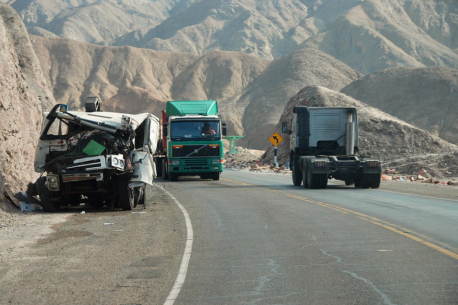 Lorries on the Panamerican Highway Photograph by Richard Fairless