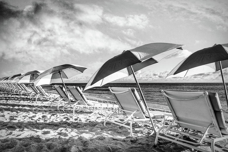 Lounging around under the Umbrellas Black and White Photograph by Debra and Dave Vanderlaan